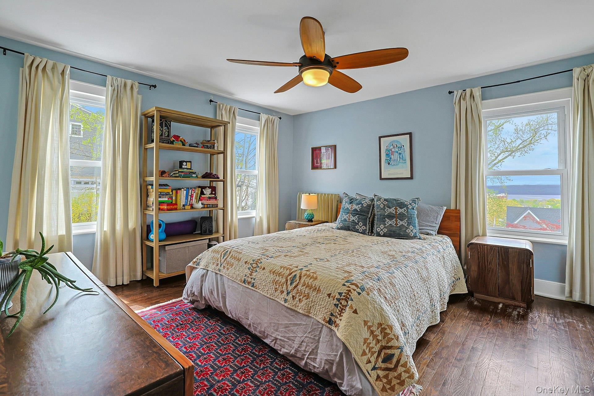 41 Clinton Avenue Ossining, NY 10562 - Photo 24 of 44 a bedroom with a bed and a large window