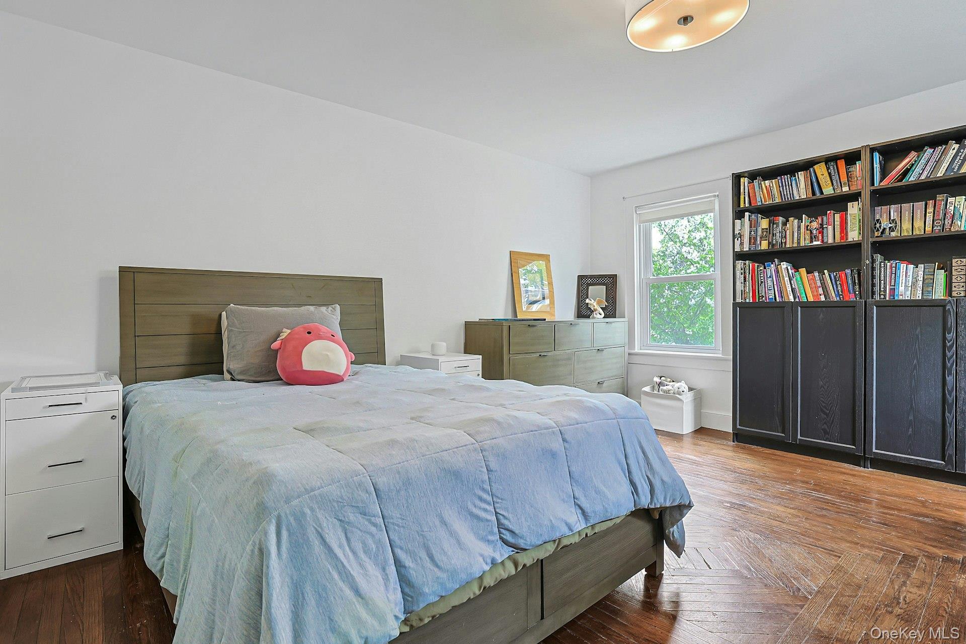 41 Clinton Avenue Ossining, NY 10562 - Photo 27 of 44 a bedroom with a bed and window