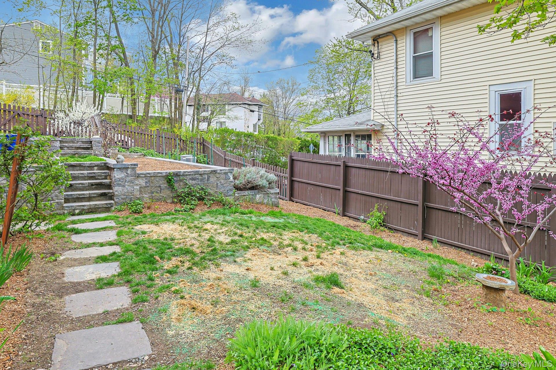 41 Clinton Avenue Ossining, NY 10562 - Photo 37 of 44 a front view of a house with garden
