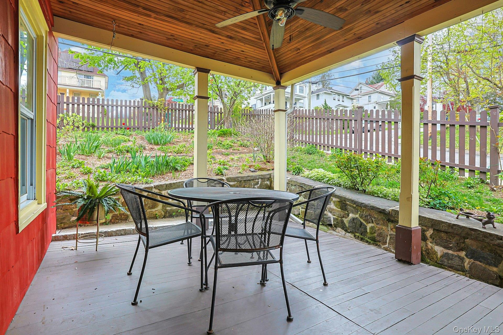 41 Clinton Avenue Ossining, NY 10562 - Photo 5 of 44 a view of a patio with a table chairs and backyard
