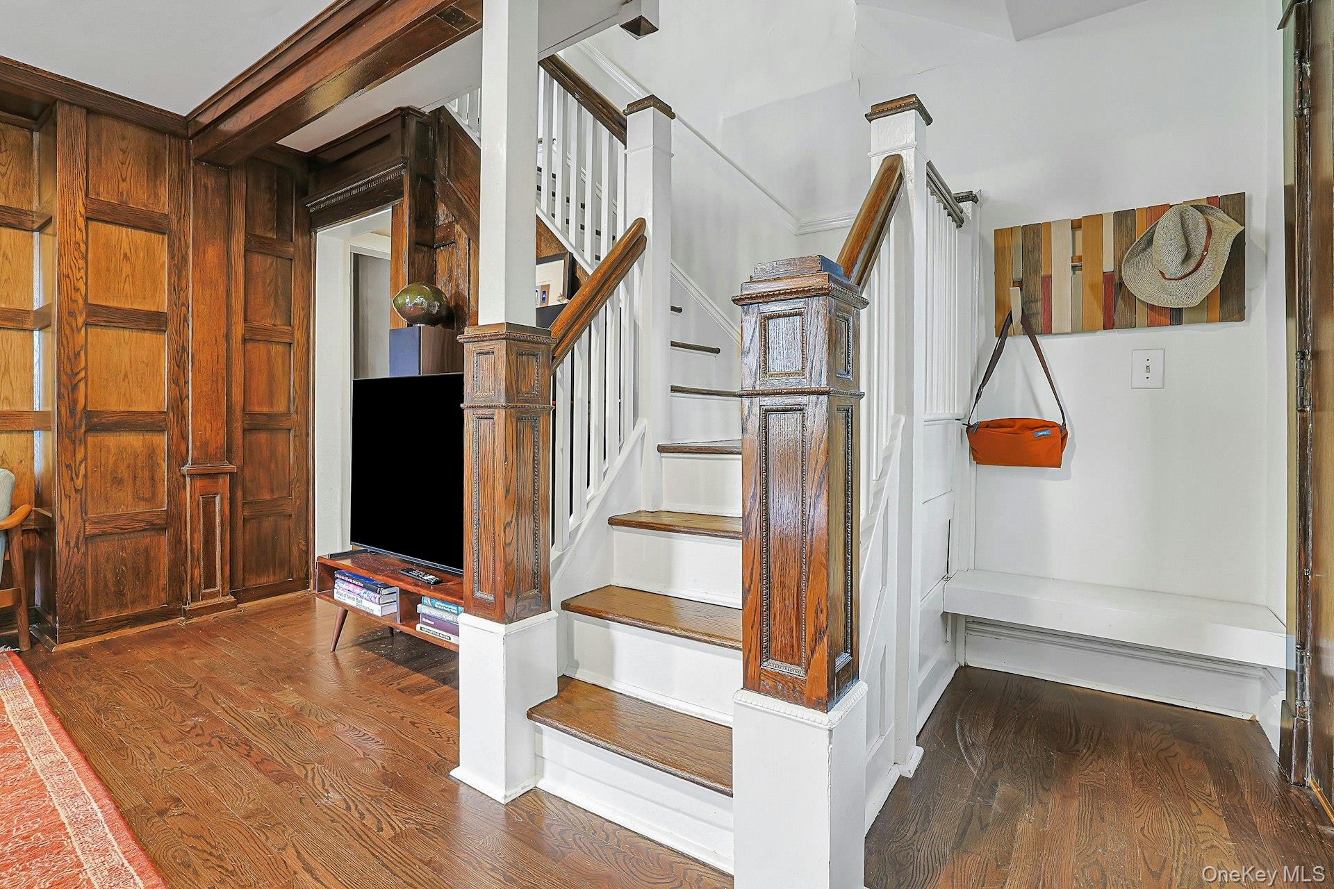 41 Clinton Avenue Ossining, NY 10562 - Photo 6 of 44 a view of a hallway with wooden floor and staircase