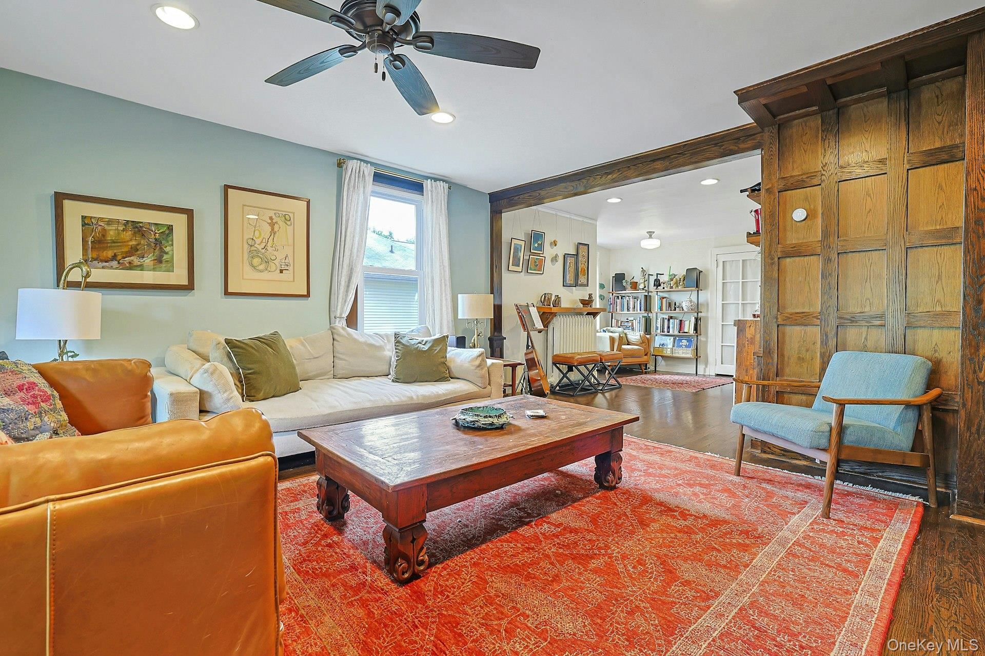 41 Clinton Avenue Ossining, NY 10562 - Photo 8 of 44 a living room with furniture and a rug