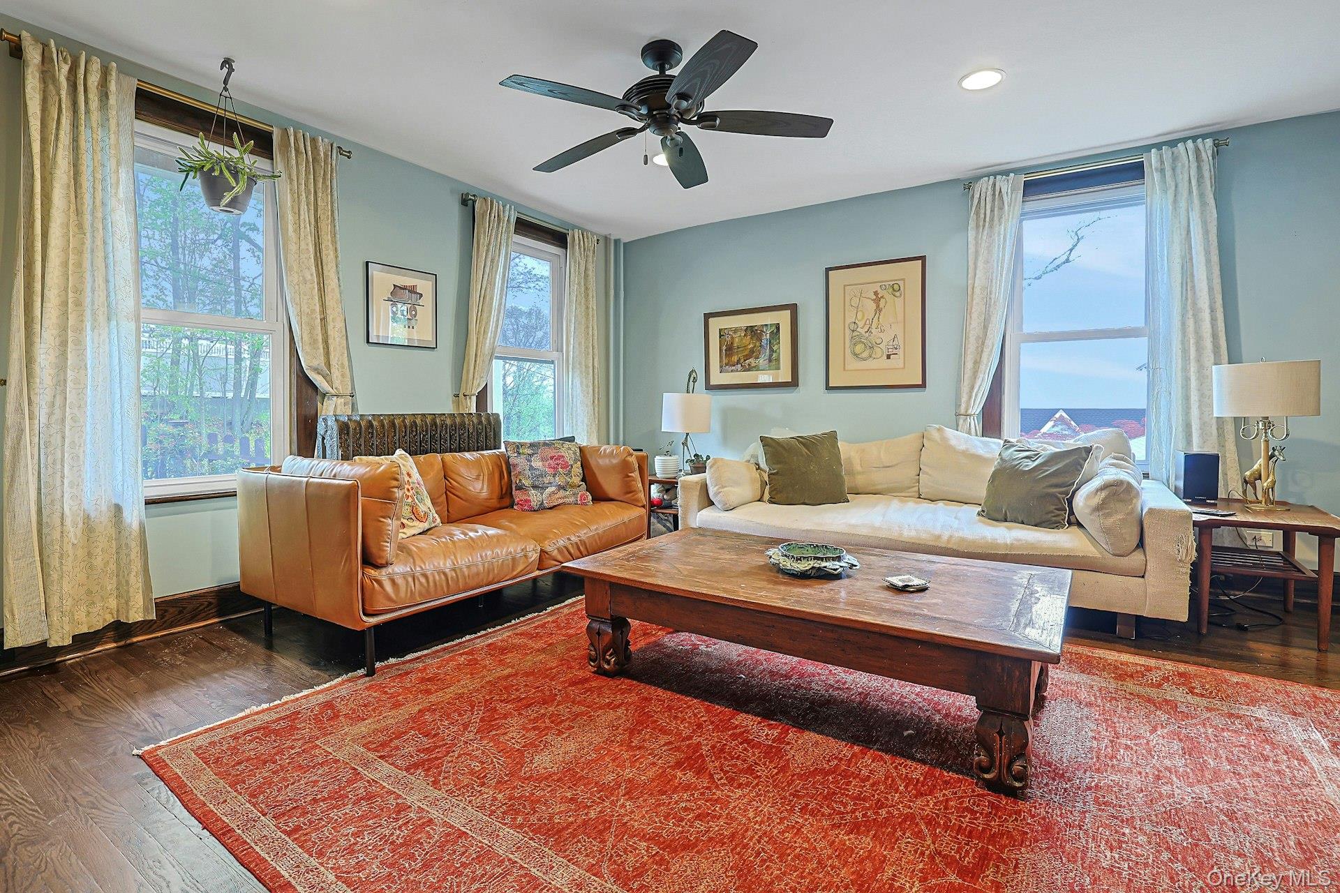 41 Clinton Avenue Ossining, NY 10562 - Photo 9 of 44 a living room with furniture and a rug