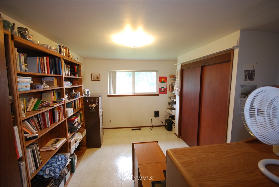 10404 Southeast 166th Street Renton, WA 98055 - Photo 21 of 29 a view of an empty room with workspace and window