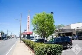 a view of a car park in front of house