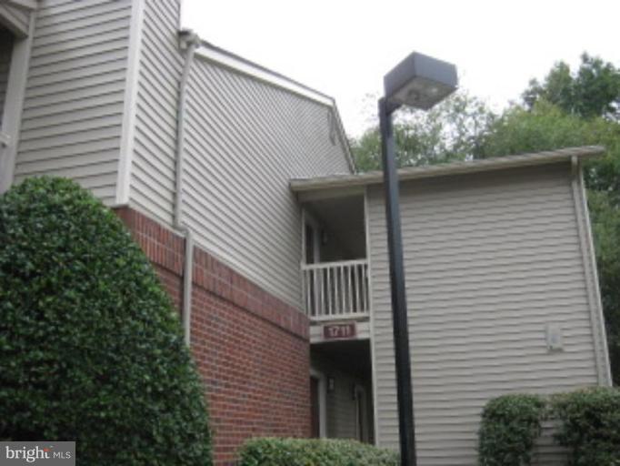 1711 Ascot Way, Unit D Reston, VA 20190 - Photo 2 of 2 a view of back yard of the house