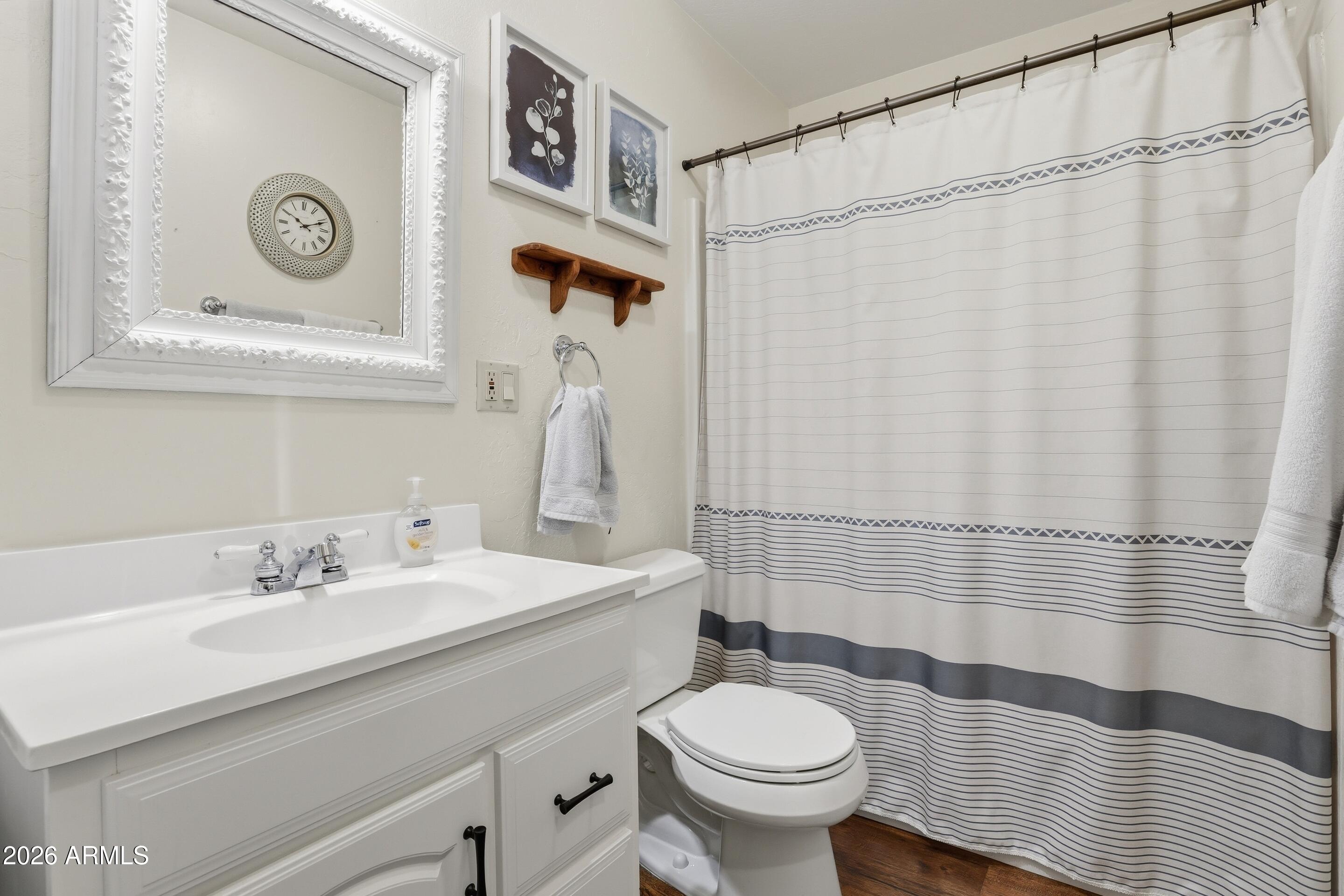 3715 Bloody Basin Road Pine, AZ 85544 - Photo 11 of 24 a bathroom with a sink and a mirror