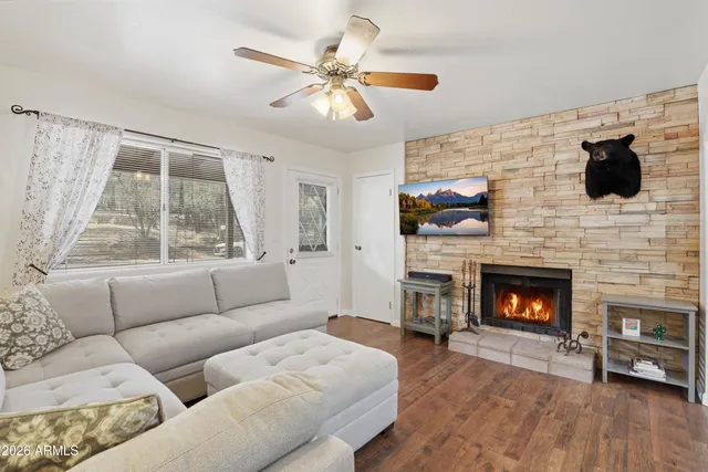 a living room with furniture and a window