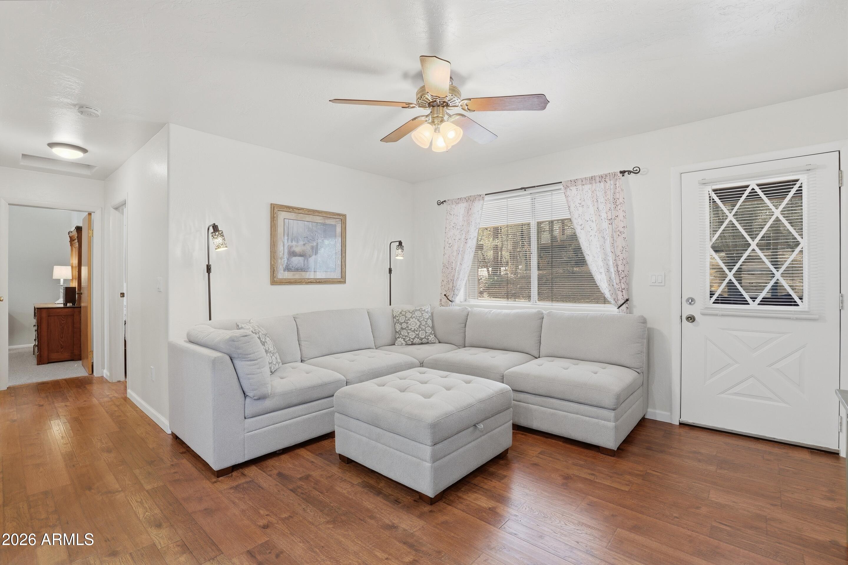 3715 Bloody Basin Road Pine, AZ 85544 - Photo 4 of 24 a living room with furniture and a window