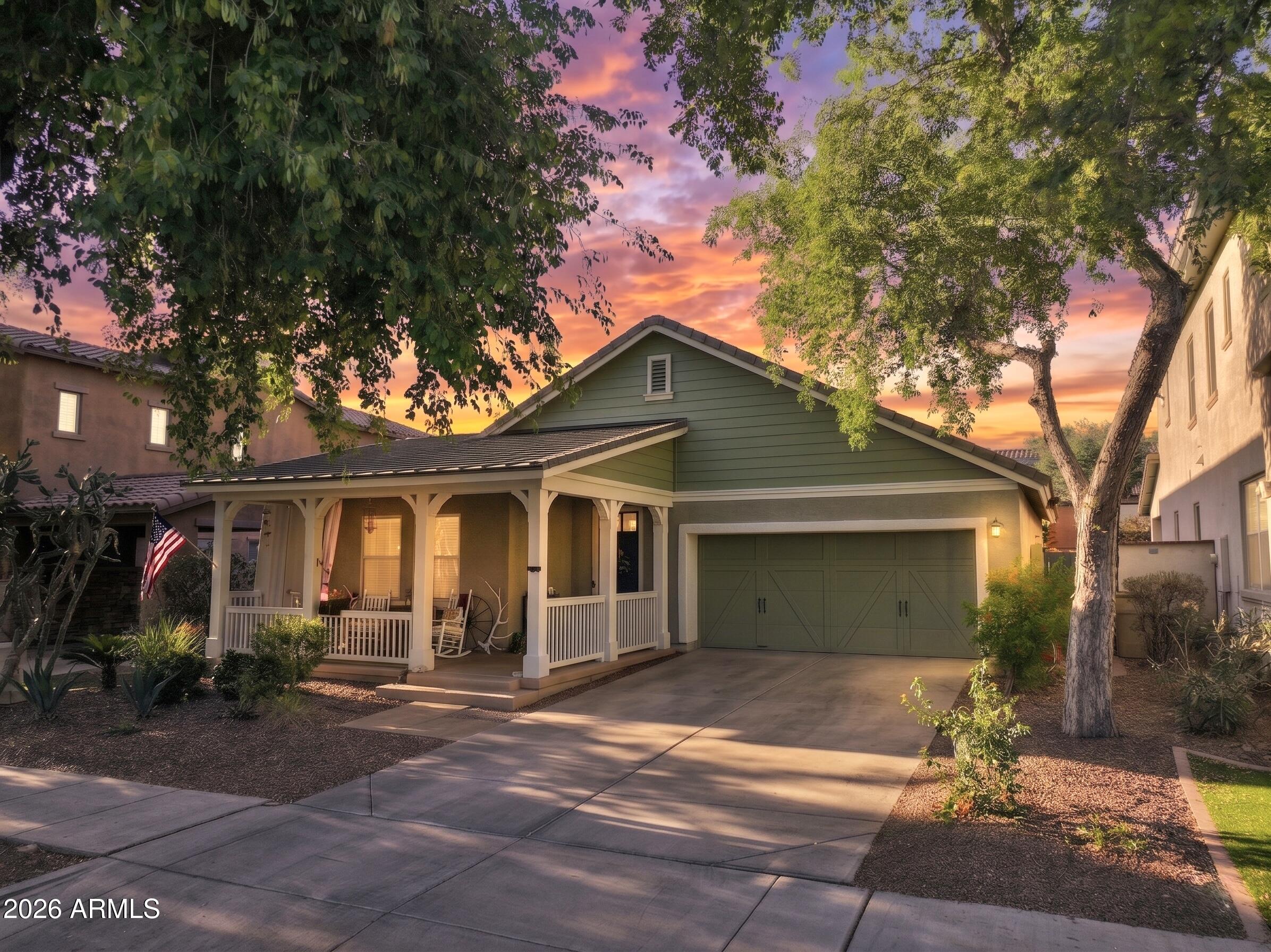 21052 West White Rock Road Buckeye, AZ 85396 - Photo 2 of 52 Twilight in front of home