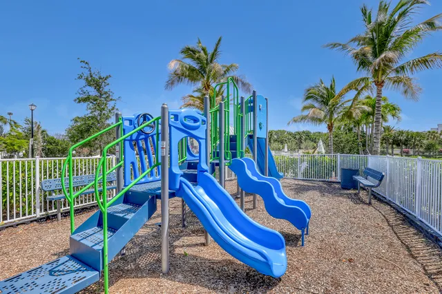 a view of a park with a slide
