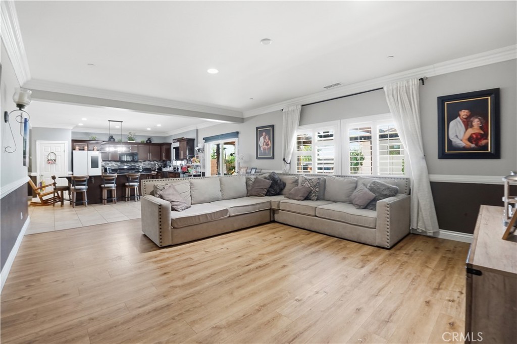 4415 Bethel Road Jurupa Valley, CA 92509 - Photo 11 of 65 a living room with furniture and a wooden floor