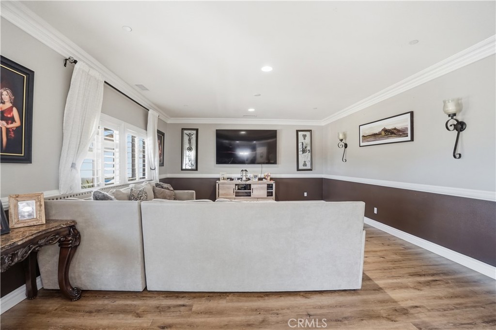 4415 Bethel Road Jurupa Valley, CA 92509 - Photo 13 of 65 a living room with furniture and a flat screen tv