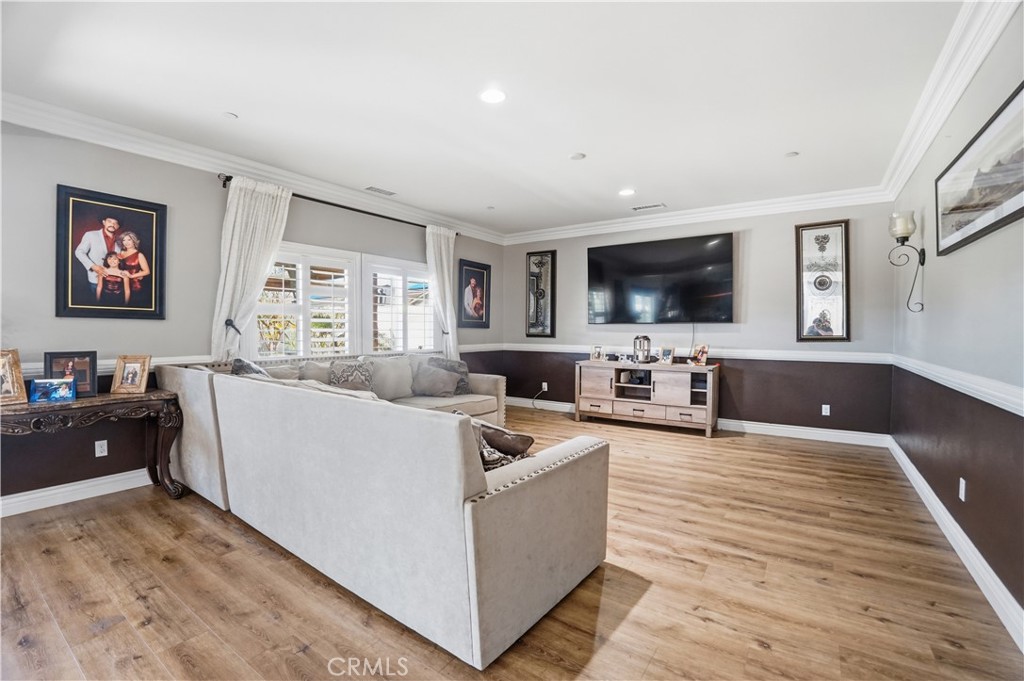 4415 Bethel Road Jurupa Valley, CA 92509 - Photo 14 of 65 a living room with furniture and a flat screen tv