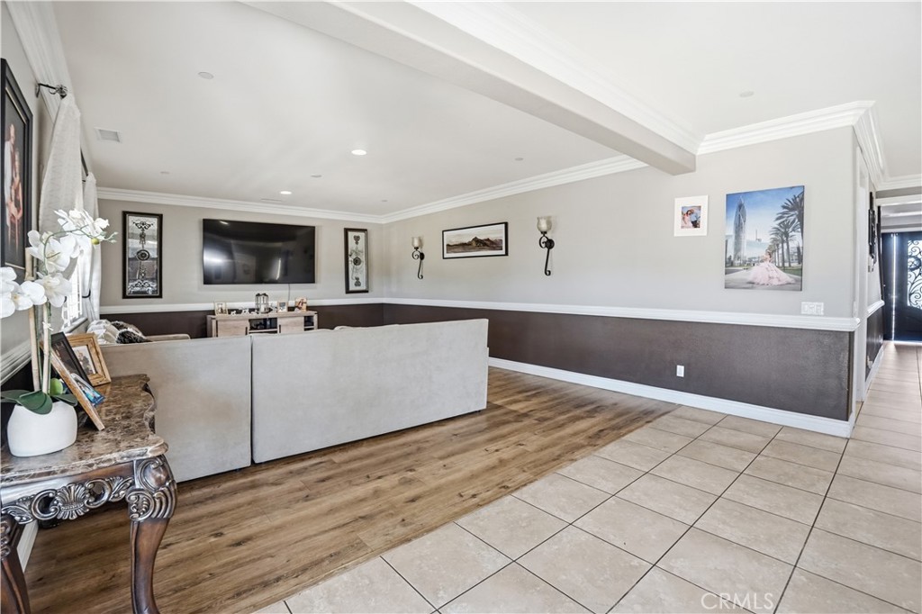 4415 Bethel Road Jurupa Valley, CA 92509 - Photo 15 of 65 a living room with furniture and a flat screen tv