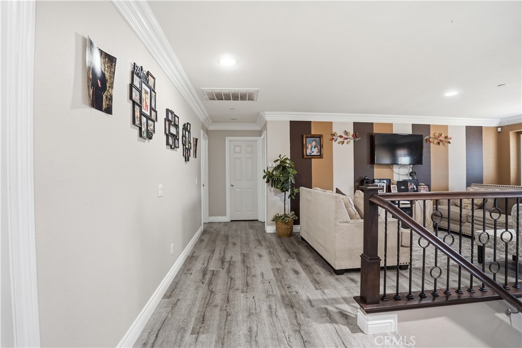 4415 Bethel Road Jurupa Valley, CA 92509 - Photo 25 of 65 a view of livingroom with furniture and wooden floor