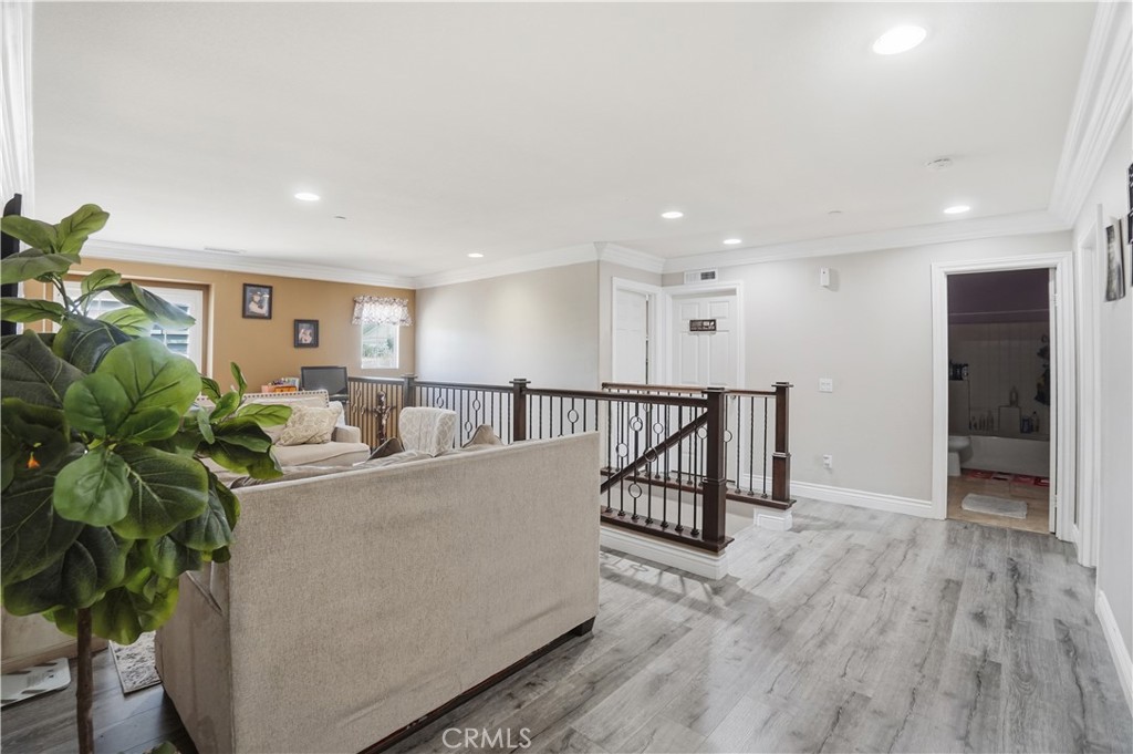 4415 Bethel Road Jurupa Valley, CA 92509 - Photo 26 of 65 a living room with furniture and a potted plant