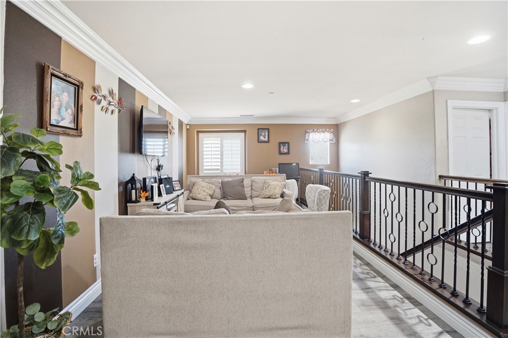 4415 Bethel Road Jurupa Valley, CA 92509 - Photo 27 of 65 a living room with furniture potted plant and a window
