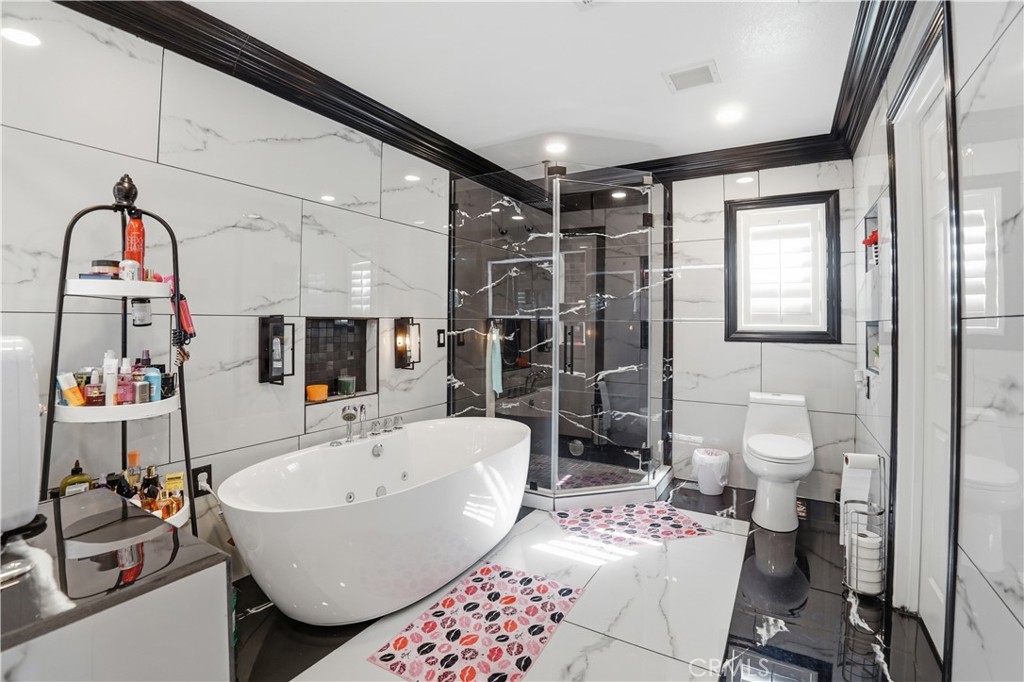 4415 Bethel Road Jurupa Valley, CA 92509 - Photo 31 of 65 a bathroom with a sink toilet and shower