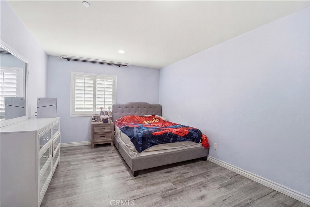 4415 Bethel Road Jurupa Valley, CA 92509 - Photo 40 of 65 a room with a bed and a window