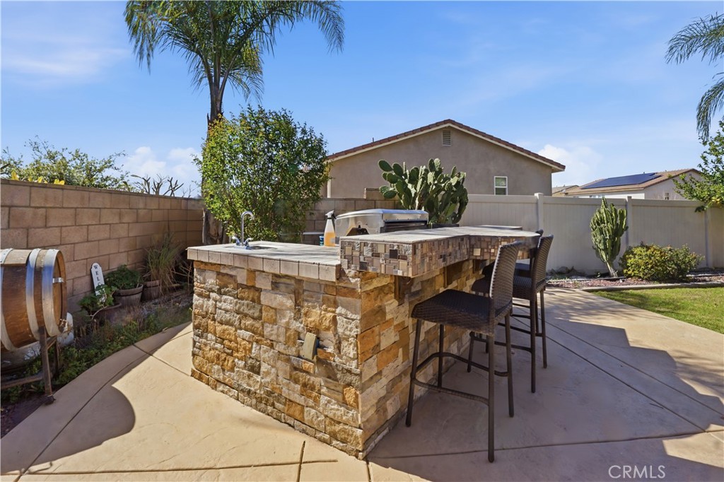4415 Bethel Road Jurupa Valley, CA 92509 - Photo 47 of 65 a view of a chairs and table in the patio