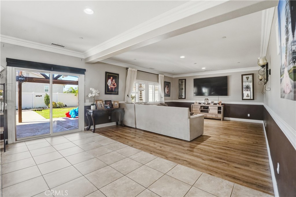 4415 Bethel Road Jurupa Valley, CA 92509 - Photo 54 of 65 a living room with furniture and a flat screen tv