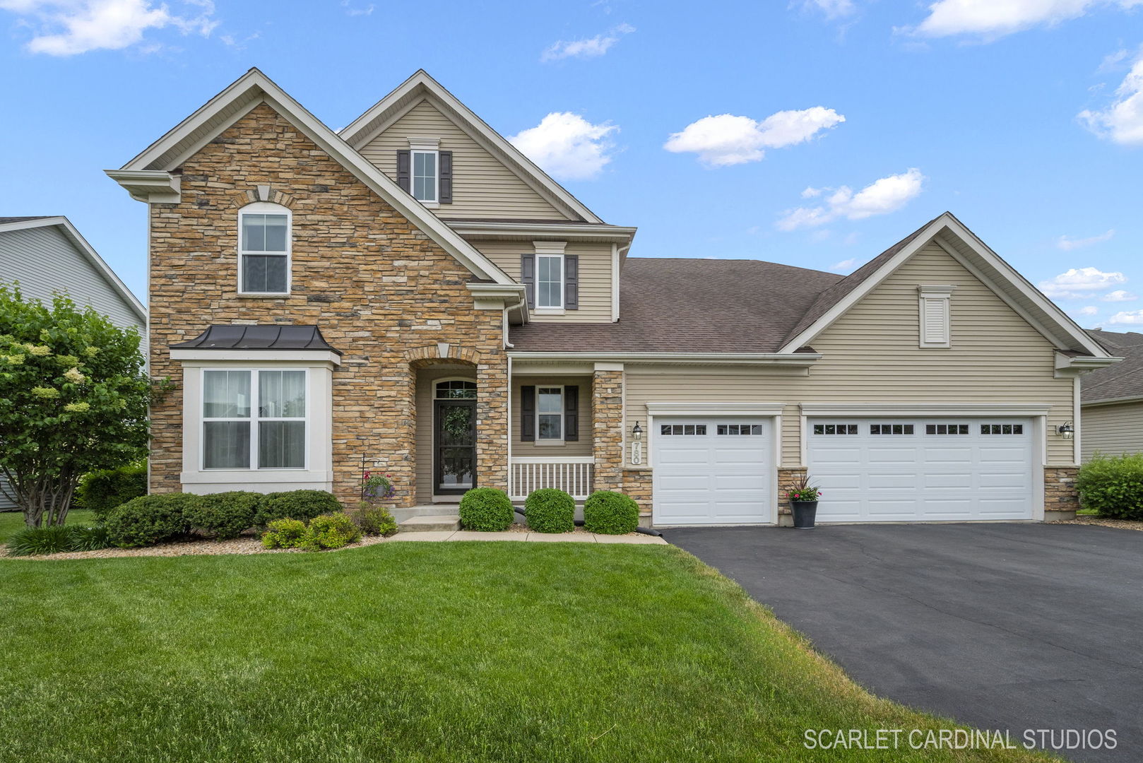 780 Ridgeview Lane Sugar Grove, IL 60554 - Photo 1 of 30 a front view of a house with a yard and garage