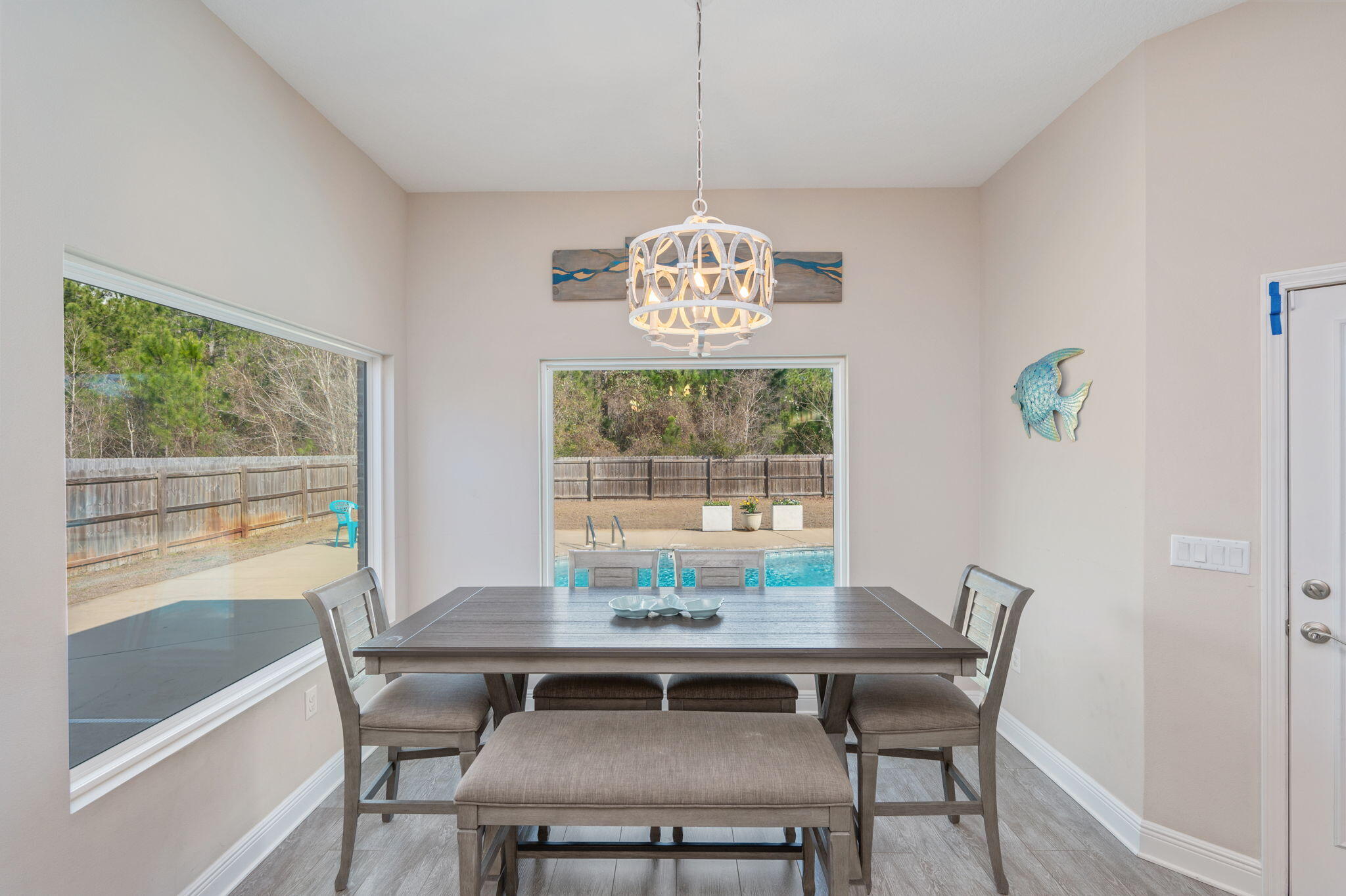 2714 Ola Broxson Road Navarre, FL 32566 - Photo 23 of 52 a view of a dining room with furniture window and outside view