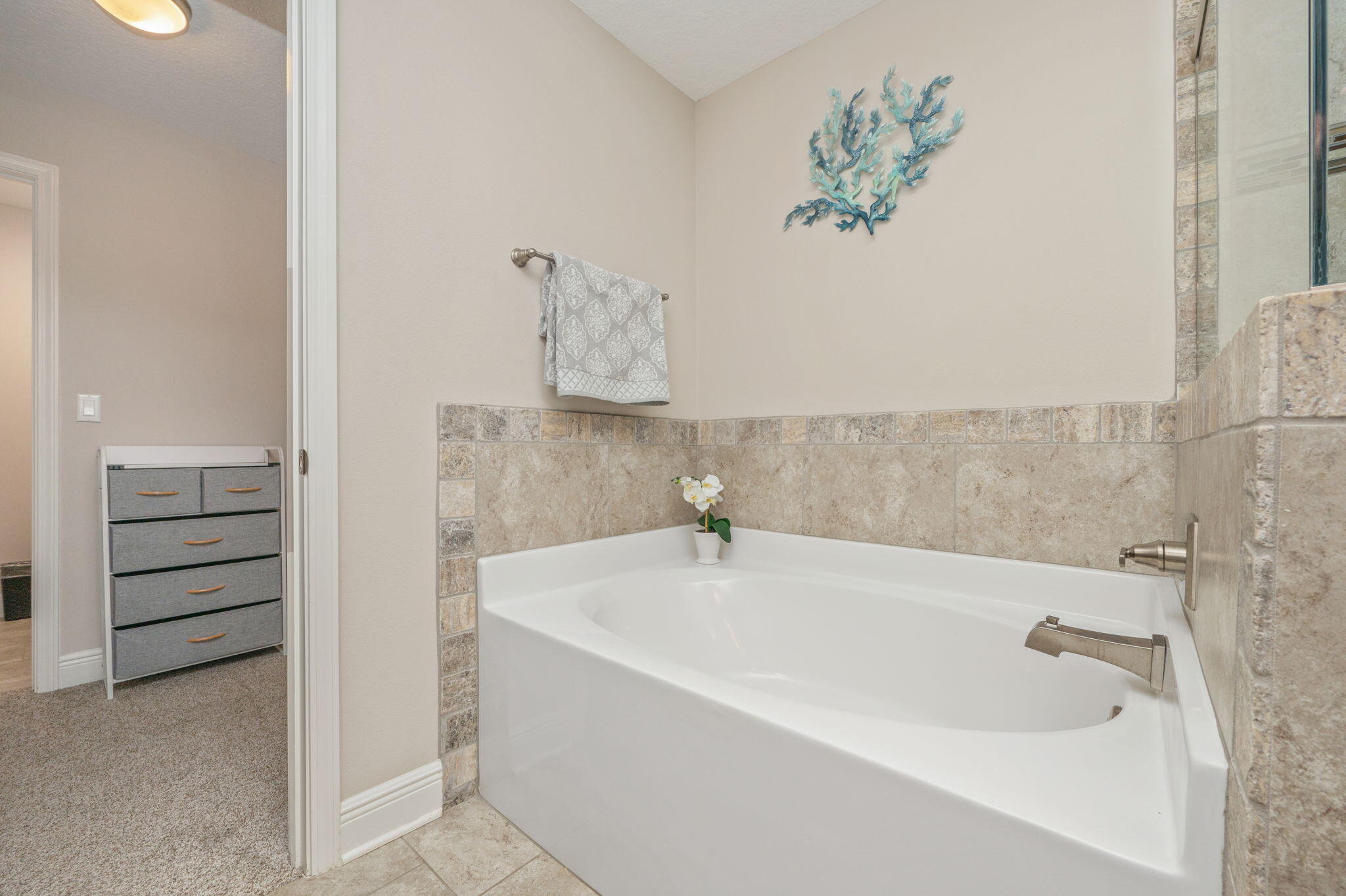 2714 Ola Broxson Road Navarre, FL 32566 - Photo 34 of 52 a bathroom with a bathtub and a shower