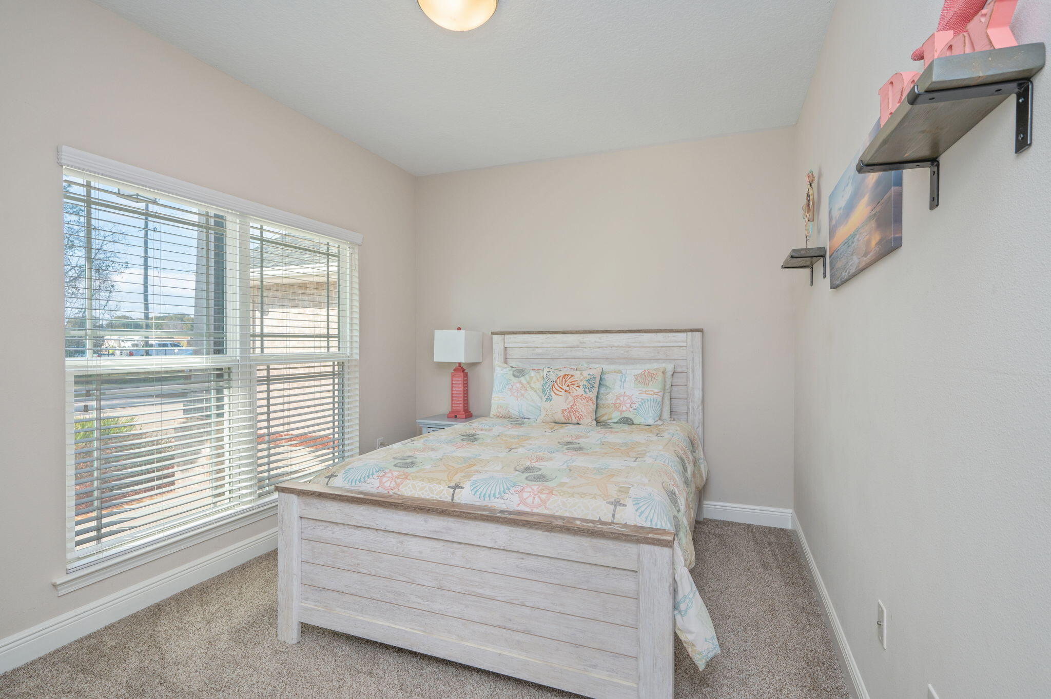 2714 Ola Broxson Road Navarre, FL 32566 - Photo 39 of 52 a room with a bed and a window