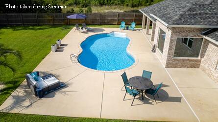 2714 Ola Broxson Road Navarre, FL 32566 - Photo 4 of 52 an outdoor space with furniture