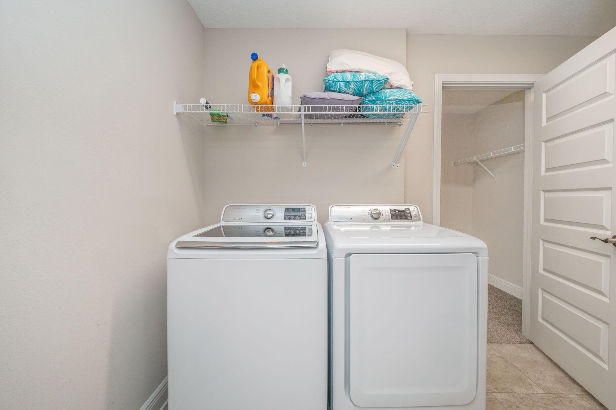 2714 Ola Broxson Road Navarre, FL 32566 - Photo 45 of 52 a utility room with dryer and washer