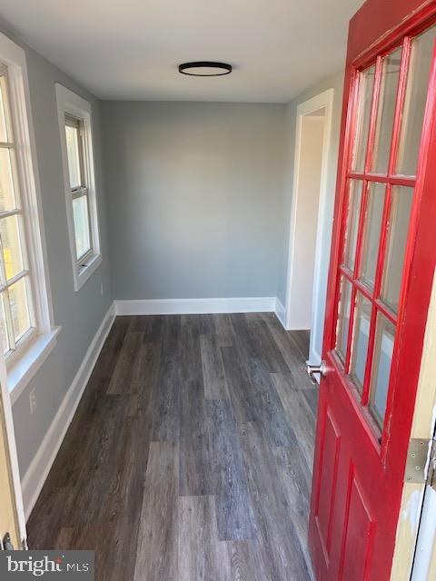 1417 State Road, Unit A Phoenixville, PA 19460 - Photo 16 of 31 an empty room with wooden floor and windows