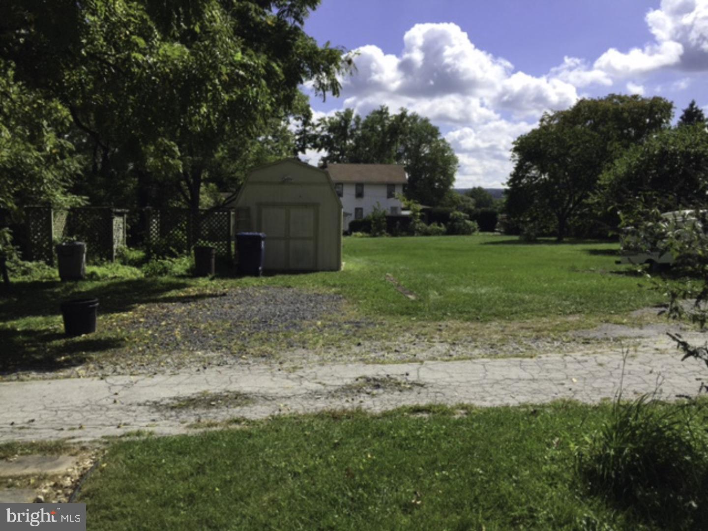 1417 State Road, Unit A Phoenixville, PA 19460 - Photo 31 of 31 a view of a backyard with large trees