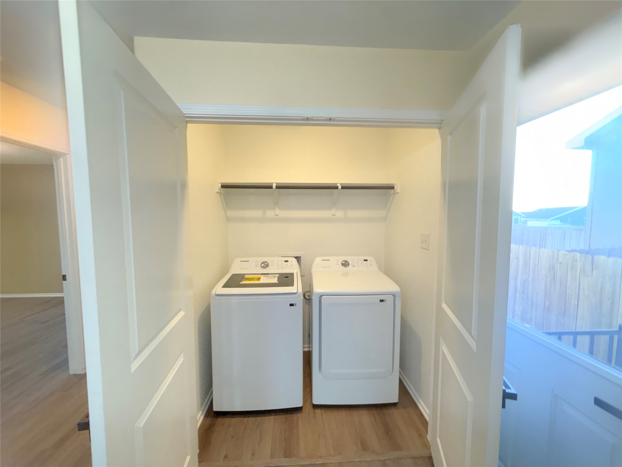 228 Texas Angel Way Jarrell, TX 76537 - Photo 9 of 33 a utility room with dryer and washer