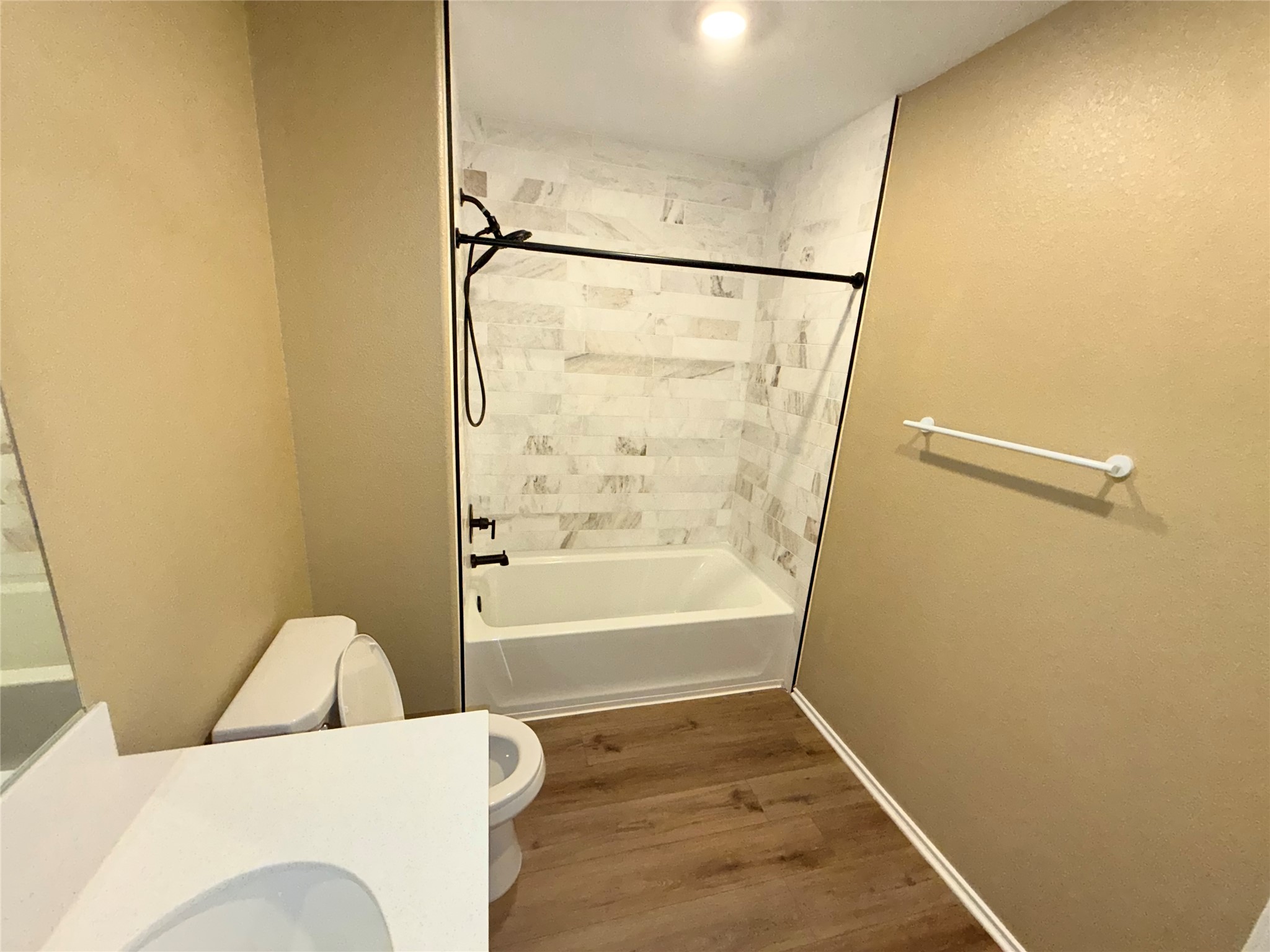 228 Texas Angel Way Jarrell, TX 76537 - Photo 13 of 33 a bathroom with a bathtub and shower