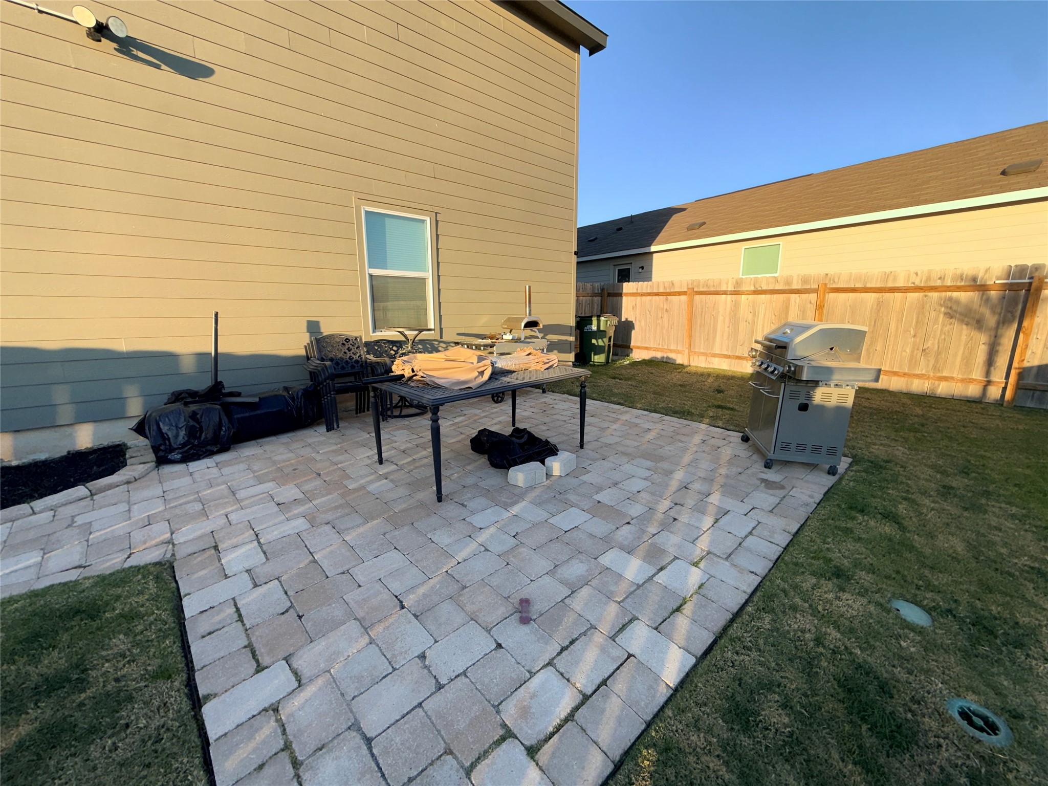 228 Texas Angel Way Jarrell, TX 76537 - Photo 27 of 33 a backyard of a house with table and chairs