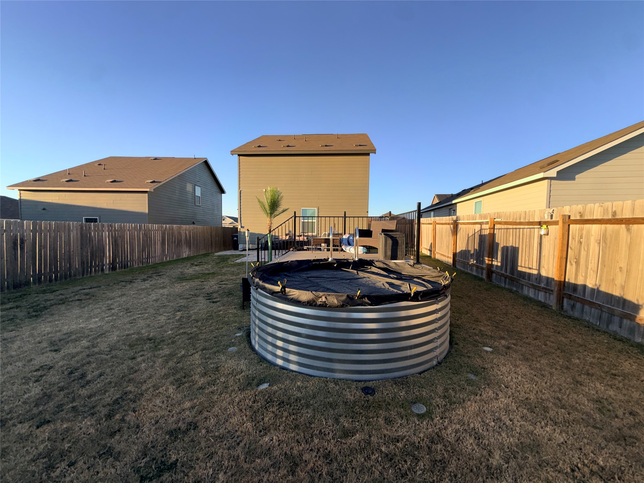 228 Texas Angel Way Jarrell, TX 76537 - Photo 28 of 33 a house view with a backyard space