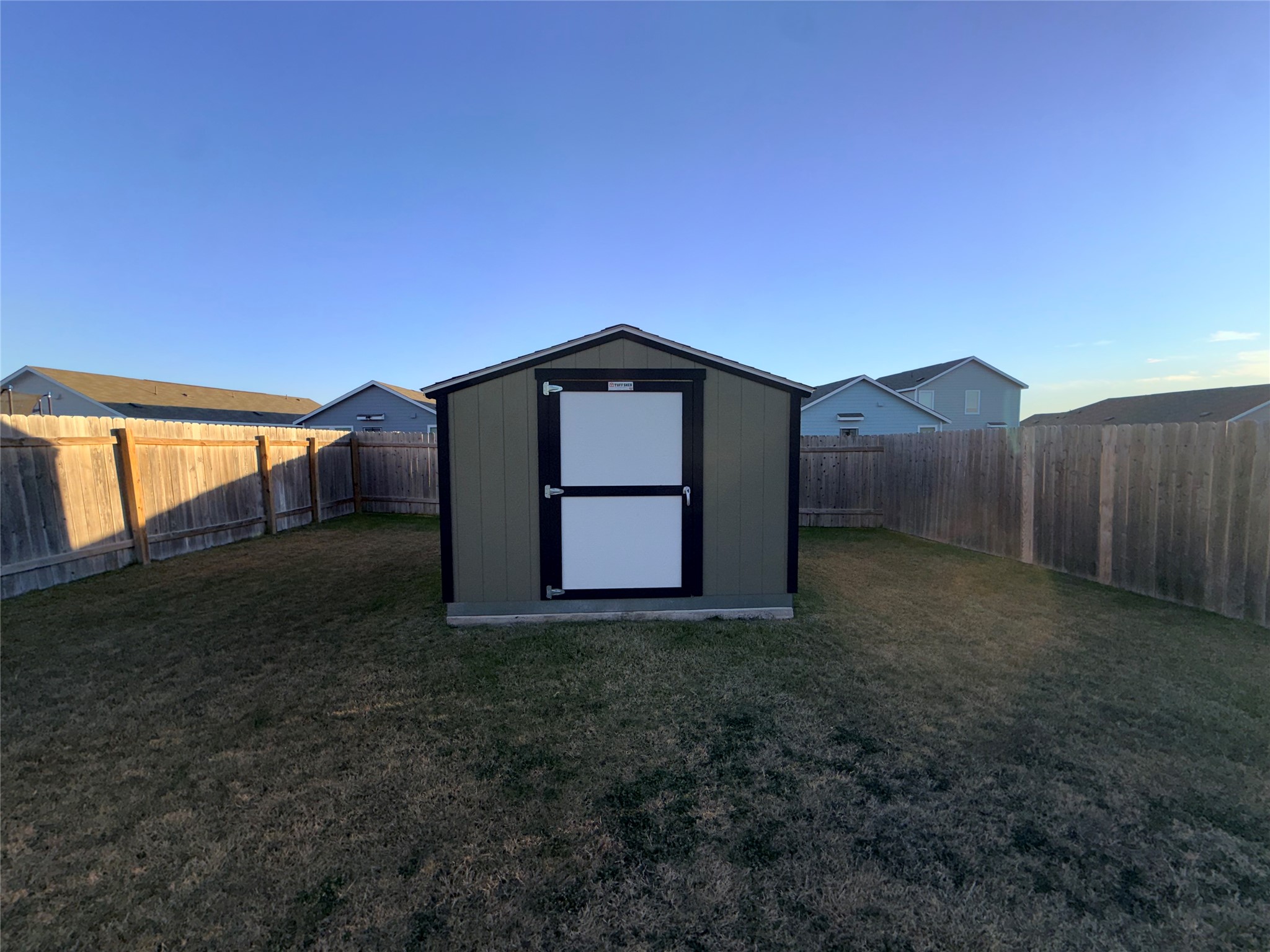 228 Texas Angel Way Jarrell, TX 76537 - Photo 31 of 33 a view of a backyard of the house