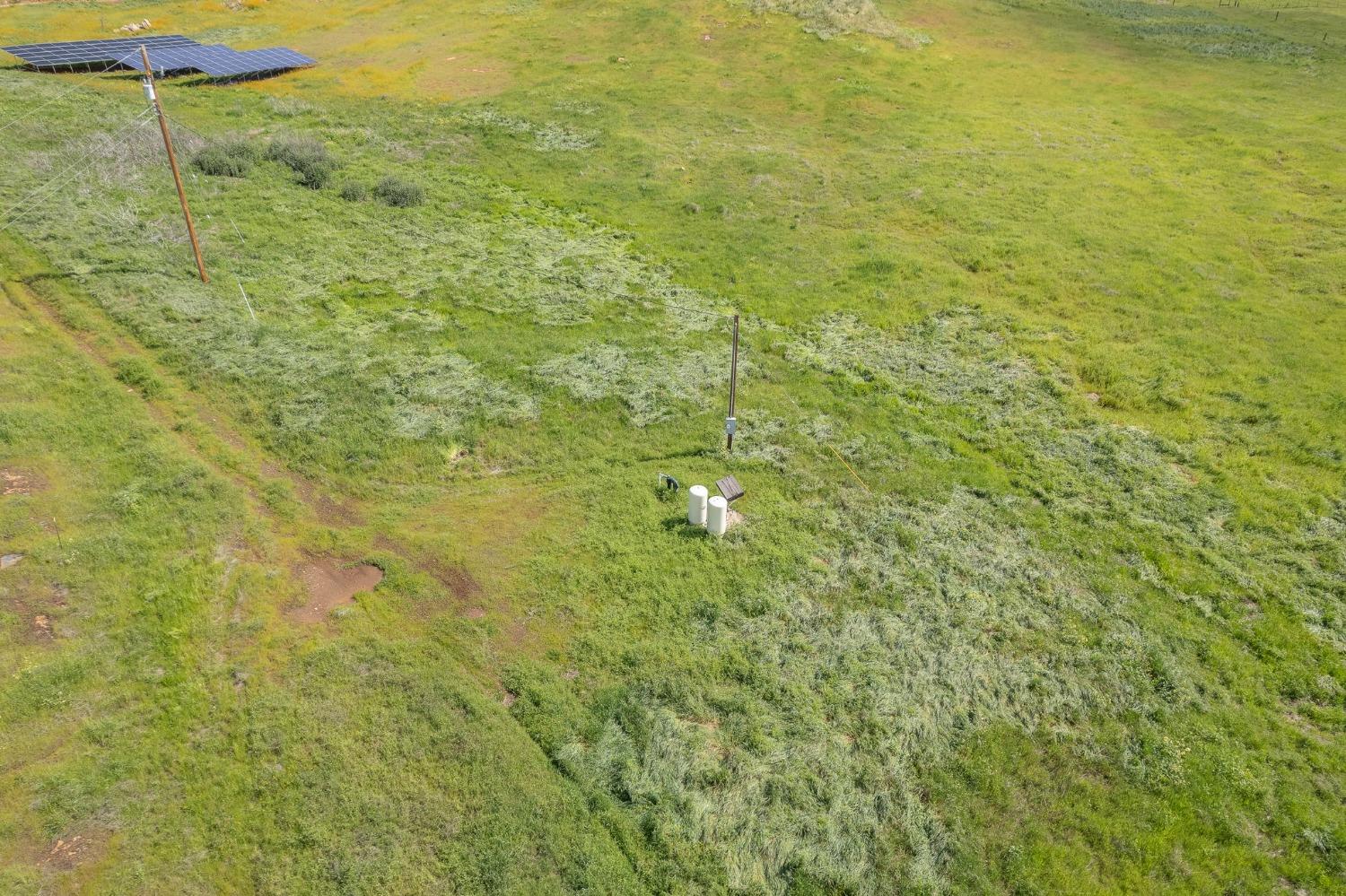 5 Summit Mountain Road Clovis, CA 93619 - Photo 19 of 28 a view of a yard with an outdoor space
