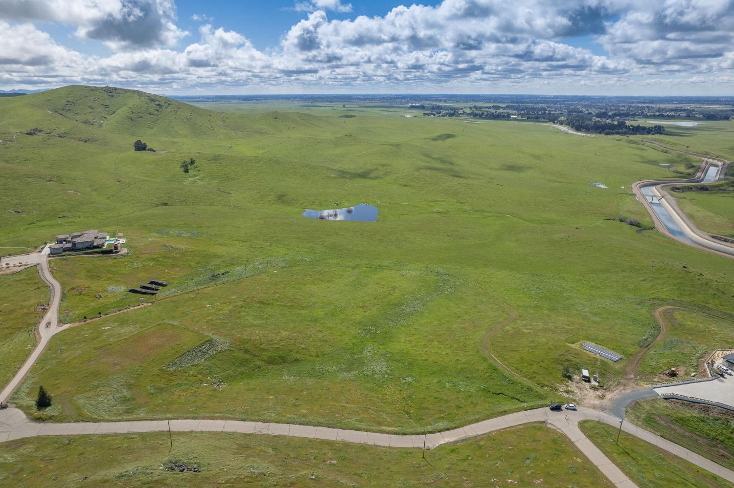 5 Summit Mountain Road Clovis, CA 93619 - Photo 5 of 28 a bathroom with a granite countertop sink and a mirror