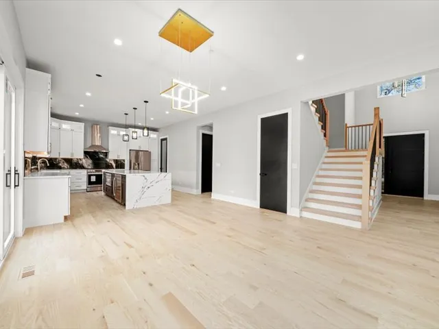 a view of a kitchen with furniture and a kitchen