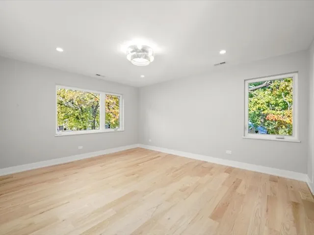 an empty room with windows