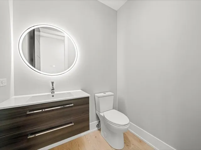 a bathroom with a toilet and a sink