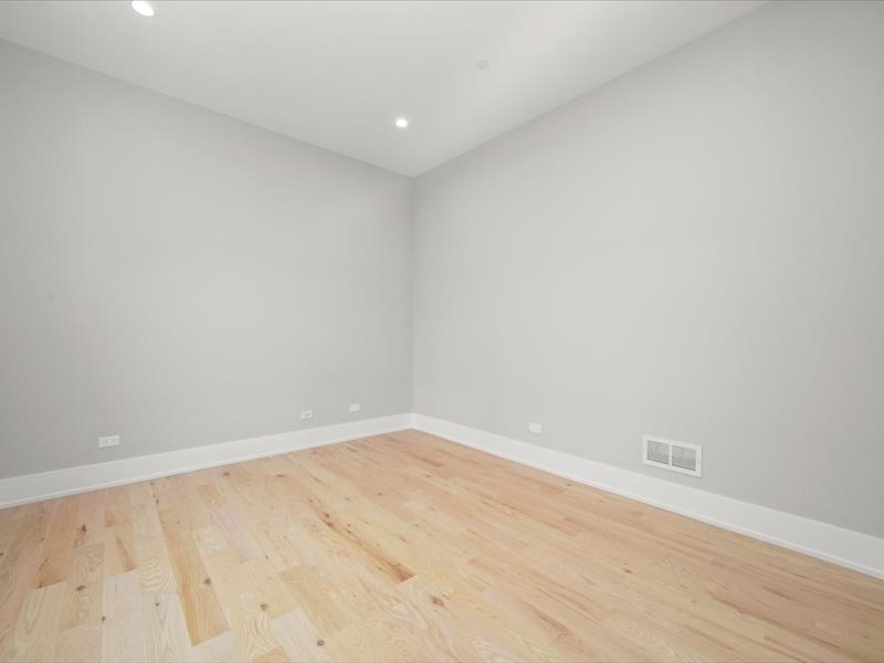 7137 South 87th Avenue Justice, IL 60458 - Photo 26 of 34 a view of an empty room