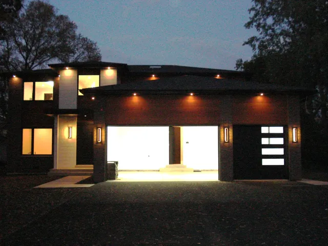 a view of an empty room with a fireplace and a potted plant