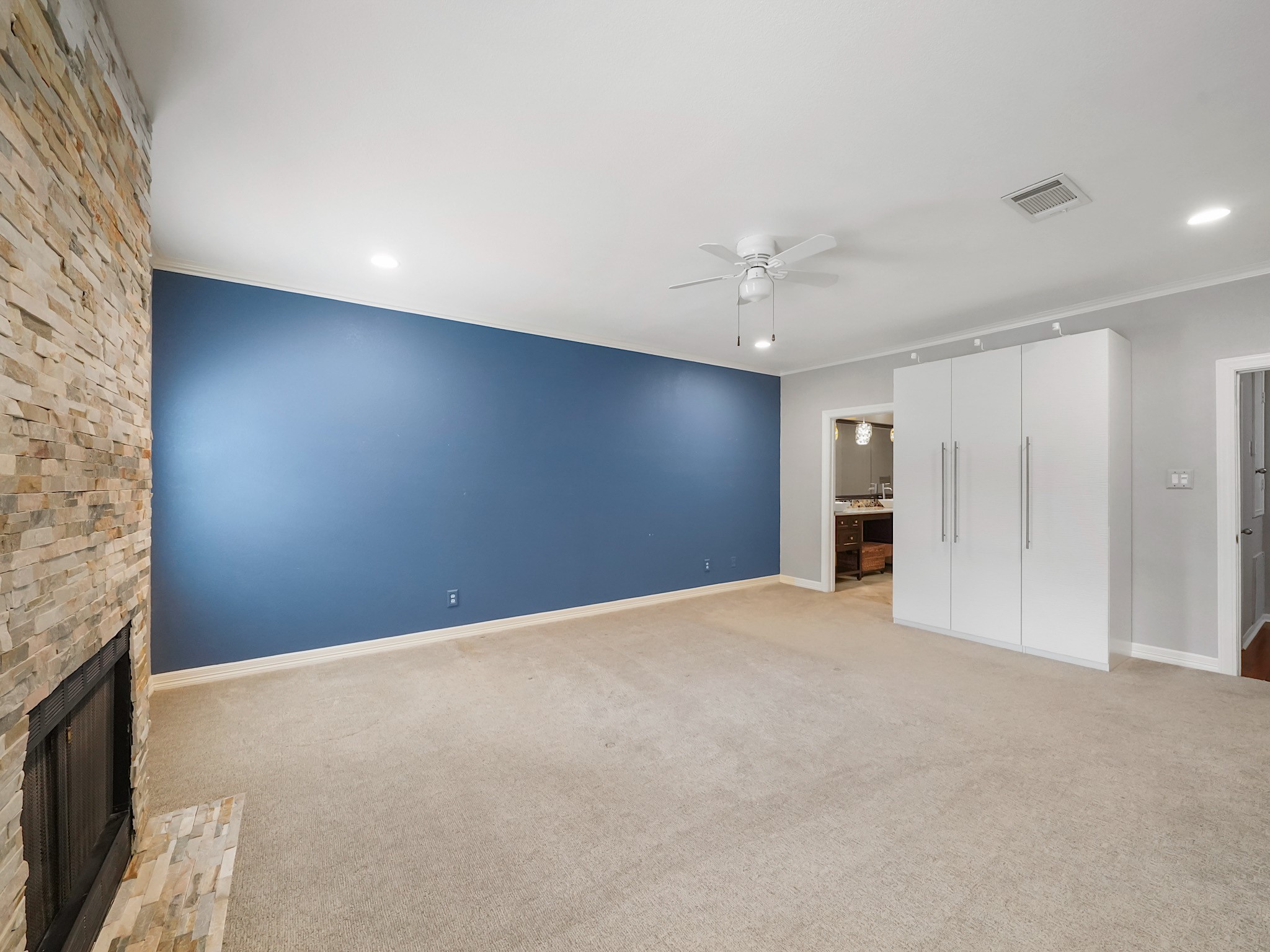 6000 Reims Road, Unit 2205 Houston, TX 77036 - Photo 16 of 35 Open and airy primary bedroom with abundant space for personalization.