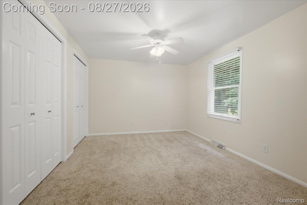 10100 Springtime Circle Clarkston, MI 48348 - Photo 42 of 73 Carpeted flooring paired with neutral-toned walls