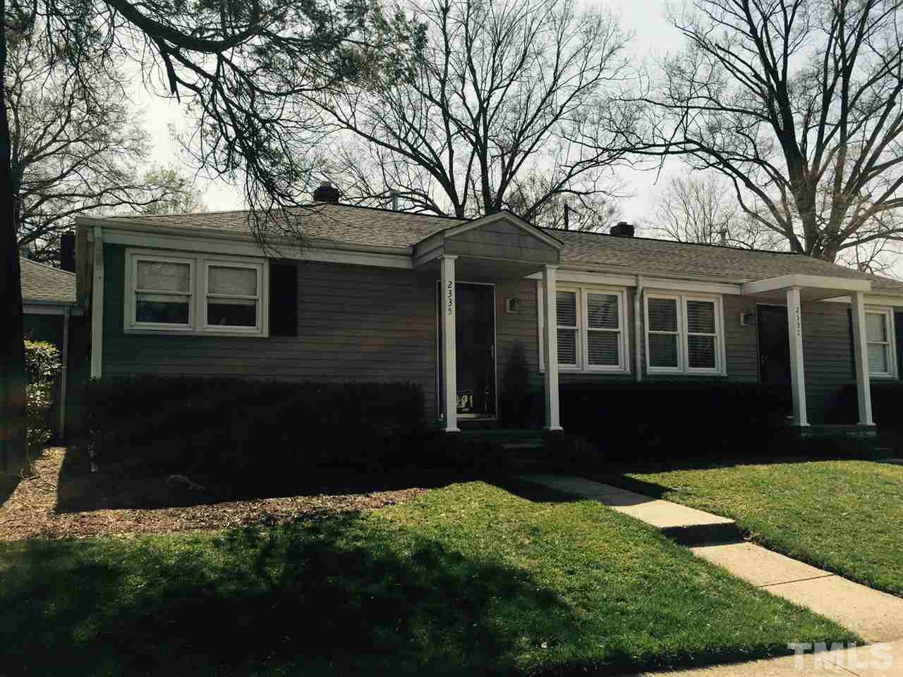 2335 Bernard Street, Unit 2335 Raleigh, NC 27608 - Photo 1 of 8 front view of a house with a yard