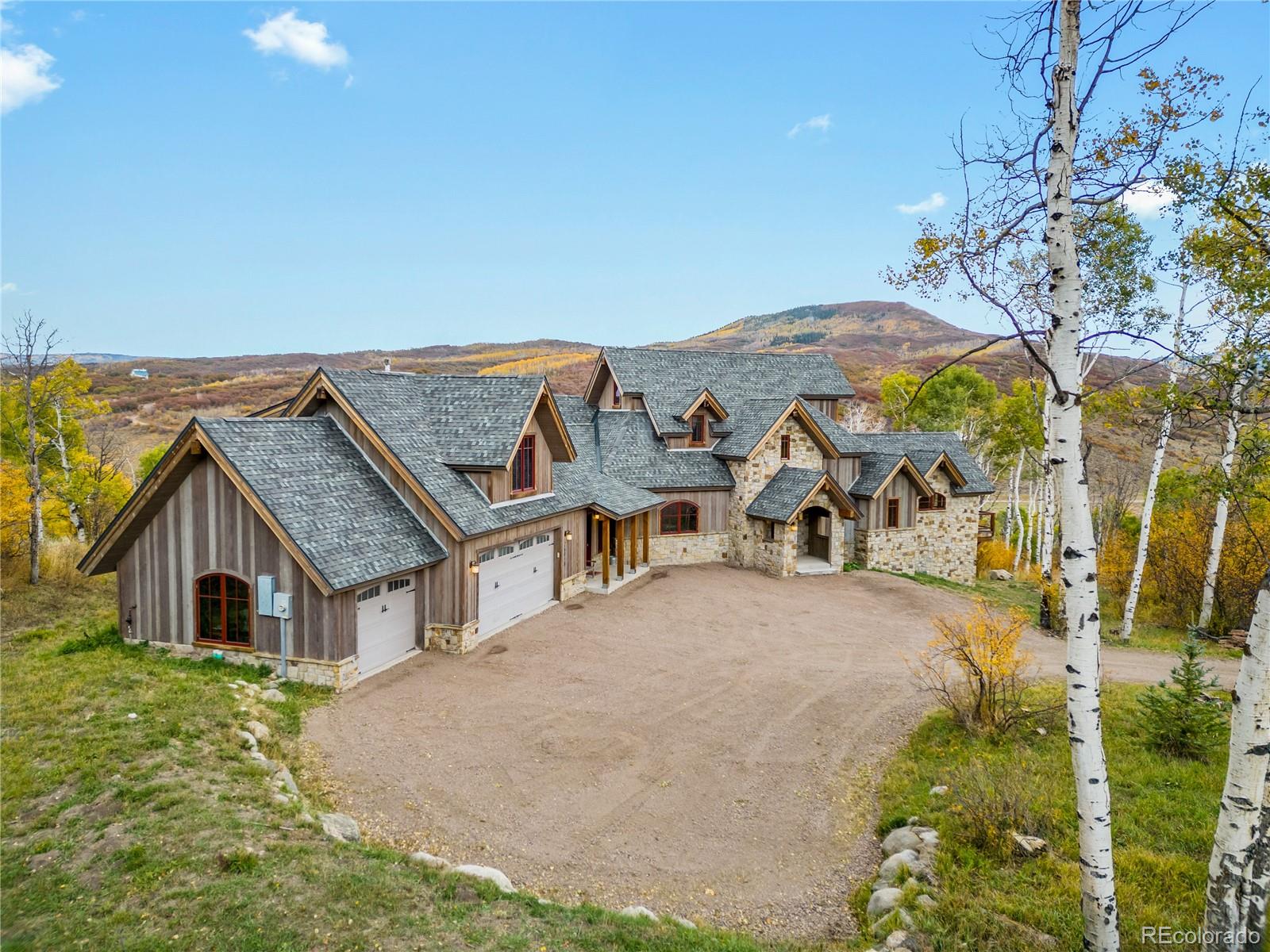 26050 Henderson Park Road Oak Creek, CO 80467 - Photo 1 of 40 a view of a house with a yard